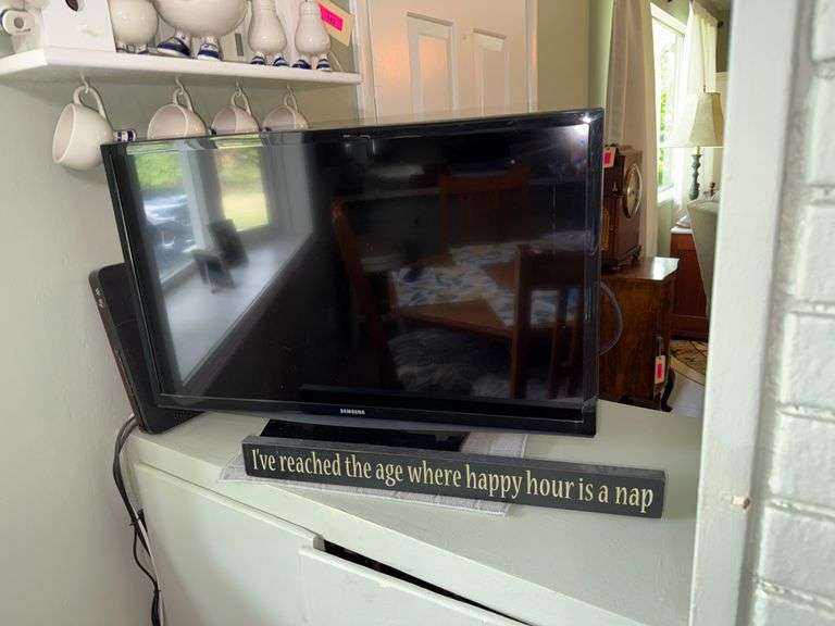 Samsung Television and Sign