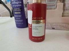 2) Shampoo, Gillette Venus Razor, Nexxus Leave-In Spray, Body Cream