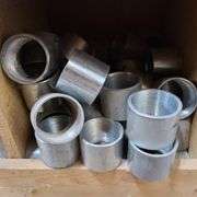 Contents of Bottom Two Rows of Bins: Bushings, PVC Elbows, PVE Conduit Couplings and More