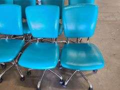 4) Teal Rolling Office Chairs