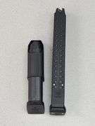 1) 9mm Magazine, 1) .45 Magazine