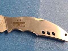 4) Pocket Knives, 1) Small Mag Light