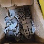 Contents of Under the Table: Fasteners, Metal Stud Clips, Roof Clips and Spacers and More