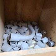 Contents of Bottom Two Rows of Bins: Bushings, PVC Elbows, PVE Conduit Couplings and More