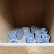 Contents of Bottom Two Rows of Bins: Bushings, PVC Elbows, PVE Conduit Couplings and More