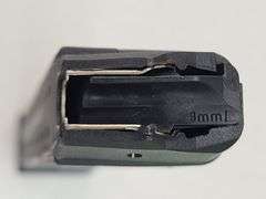 1) 9mm Magazine, 1) .45 Magazine