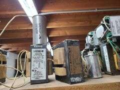 Contents of Bins: Sockets, Transformers, Magnetic Ballasts, Light Bulbs, Pull Chain Lamp Holder and 