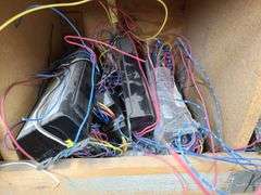 Contents of Bins: Sockets, Transformers, Magnetic Ballasts, Light Bulbs, Pull Chain Lamp Holder and 