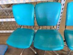 4) Teal Rolling Office Chairs
