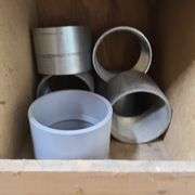 Contents of Bottom Two Rows of Bins: Bushings, PVC Elbows, PVE Conduit Couplings and More