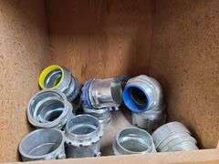 Contents of Top Two Bins: EMT Couplers, EMT Connectors, Angle Couplers, Locknuts, Nipples and More