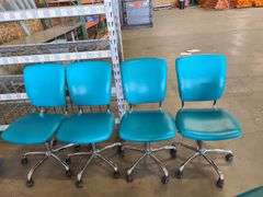 4) Teal Rolling Office Chairs