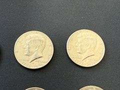 12) Kennedy Half Dollars