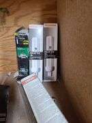 Contents of Bins: Sockets, Transformers, Magnetic Ballasts, Light Bulbs, Pull Chain Lamp Holder and 