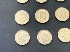 12) Kennedy Half Dollars