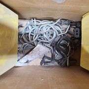 Contents of Under the Table: Fasteners, Metal Stud Clips, Roof Clips and Spacers and More