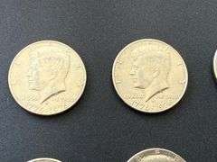 12) Kennedy Half Dollars