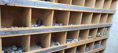 Contents of Middle Two Rows of Bins: Connectors, Couplings, Locknuts, PBs, Metal Straps and More