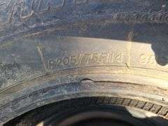 2) Tires P205/75R14, 4) Ram Chrome Center Caps - Prime Time Auctions, Inc.