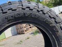 4) Toyo Open Country LT 295/65R20 - Prime Time Auctions, Inc.