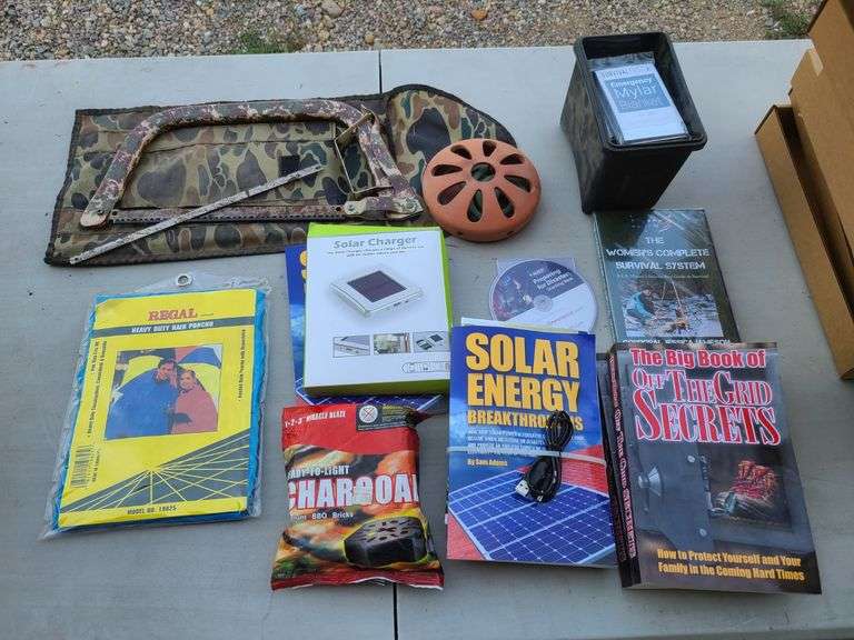Emergency Mylar Blanket, 4) Books, Solar Charger, Heavy Duty Rain Poncho, Hacksaw and More