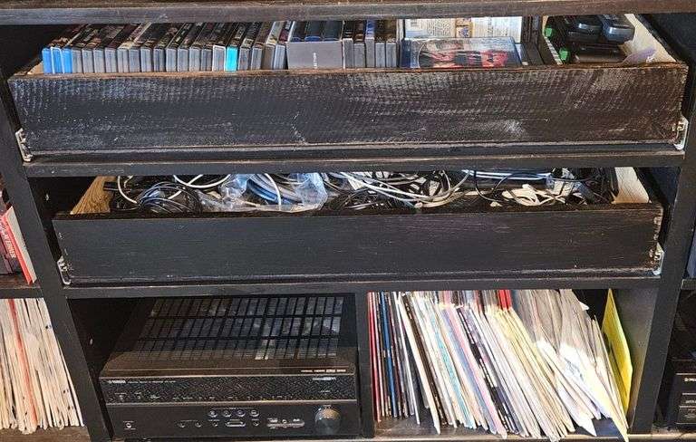 DVDS, Vinyl Records, Yamaha Stereo - Contents of Middle of Entertainment Center