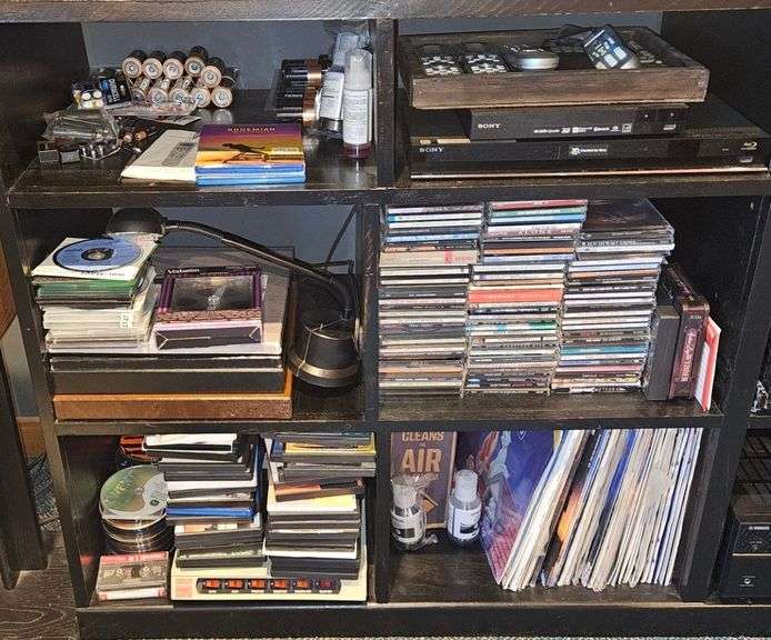CDS, Vinyl Records, Sony DVD Player - Contents of Left Side of Entertainment Center