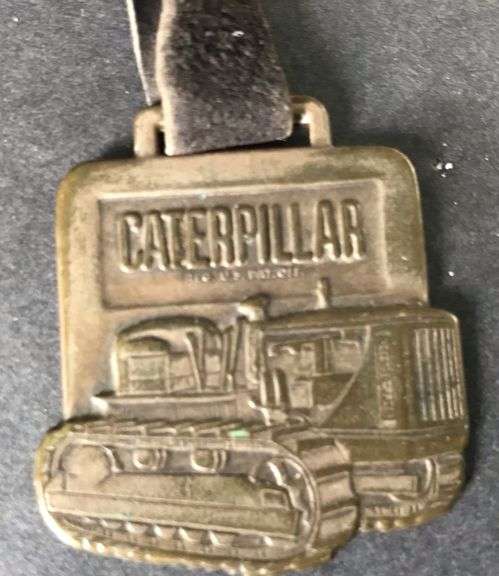 OLD “CATERPILLAR” WATCH FOB-TRACK TYPE TRACTOR-SIOUX FALLS DEALER