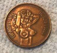 OLD “HEADS OR TAILS” POCKET COIN TOKEN WITH GRAPHICS