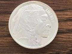 Brilliant   INDIAN HEAD//buffalo one oz silver round-with mint mark on back
