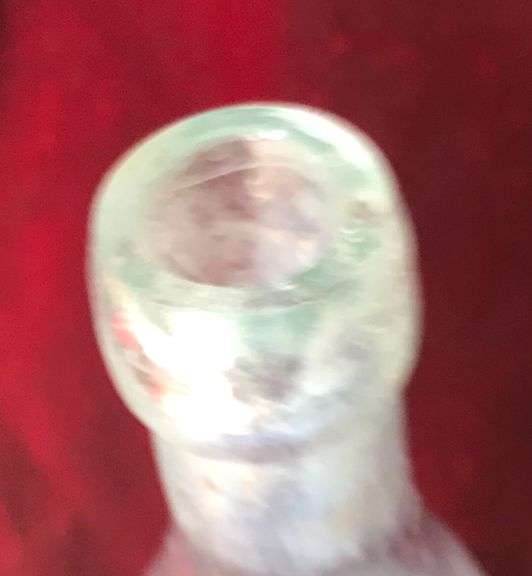 EARLY EMBOSSED BEER BOTTLE FROM “MINNEAPOLIS BREWING CO”