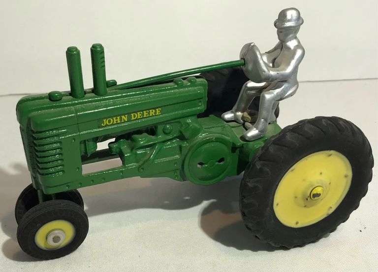 Arcade Two Cylinder Tractor with Man - Creamer Auction