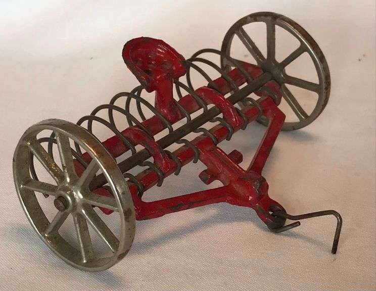 Cast Iron Arcade Toy Dump Rake