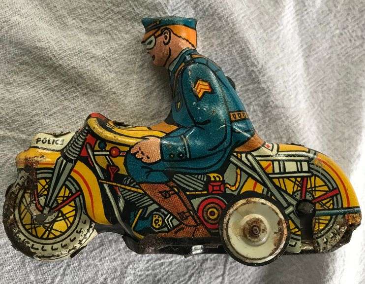 OLD “MARX” MOTORCYCLE TOY WITH POLICEMAN