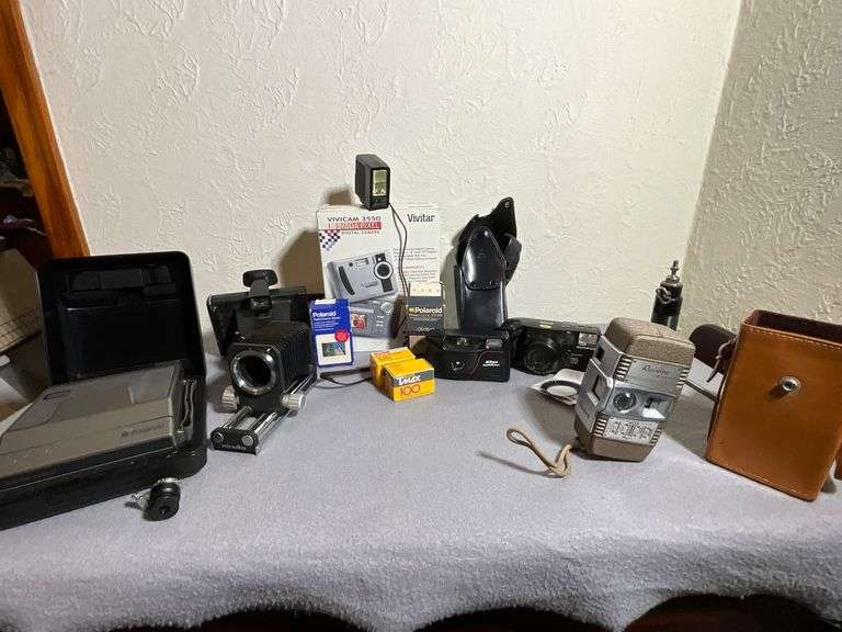 Vintage and Modern Cameras Accessories and Film Lot