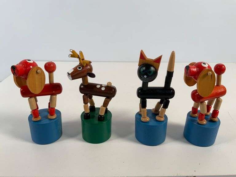 Set of Four Wooden Push Puppet Toys Featuring Animal Figures