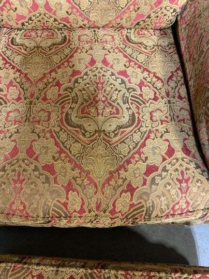 Upholstered Armchair and Ottoman with Brass Nailhead Trim