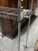 Chrome-Plated Metal Shelving Unit on Casters
