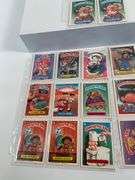 Collection of Garbage Pail Kids Trading Cards in Clear Sleeves