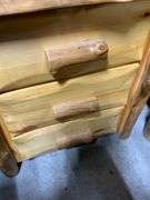 Rustic Pine Three-Drawer Nightstand With Natural Log Details