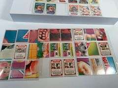 Collection of Garbage Pail Kids Trading Cards in Clear Sleeves