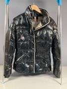 Moncler Black Shiny Quilted Jacket With Embroidered Logo and Comic Strip Instructions
