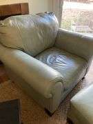 Ashley Furniture Sage Green Leather Armchair and Ottoman with Wooden Legs