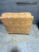 Upholstered Armchair and Ottoman with Brass Nailhead Trim