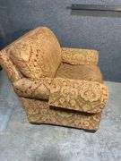 Upholstered Armchair and Ottoman with Brass Nailhead Trim