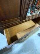 Wooden Armoire with Beveled Mirror and Carved Details