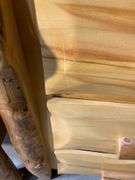 Rustic Pinewood Three-Drawer Nightstand With Natural Log Accents