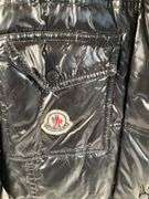 Moncler Black Shiny Quilted Jacket With Embroidered Logo and Comic Strip Instructions