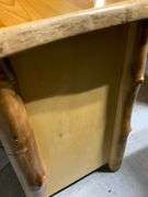 Rustic Pine Three-Drawer Nightstand With Natural Log Details