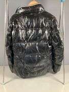 Moncler Black Shiny Quilted Jacket With Embroidered Logo and Comic Strip Instructions